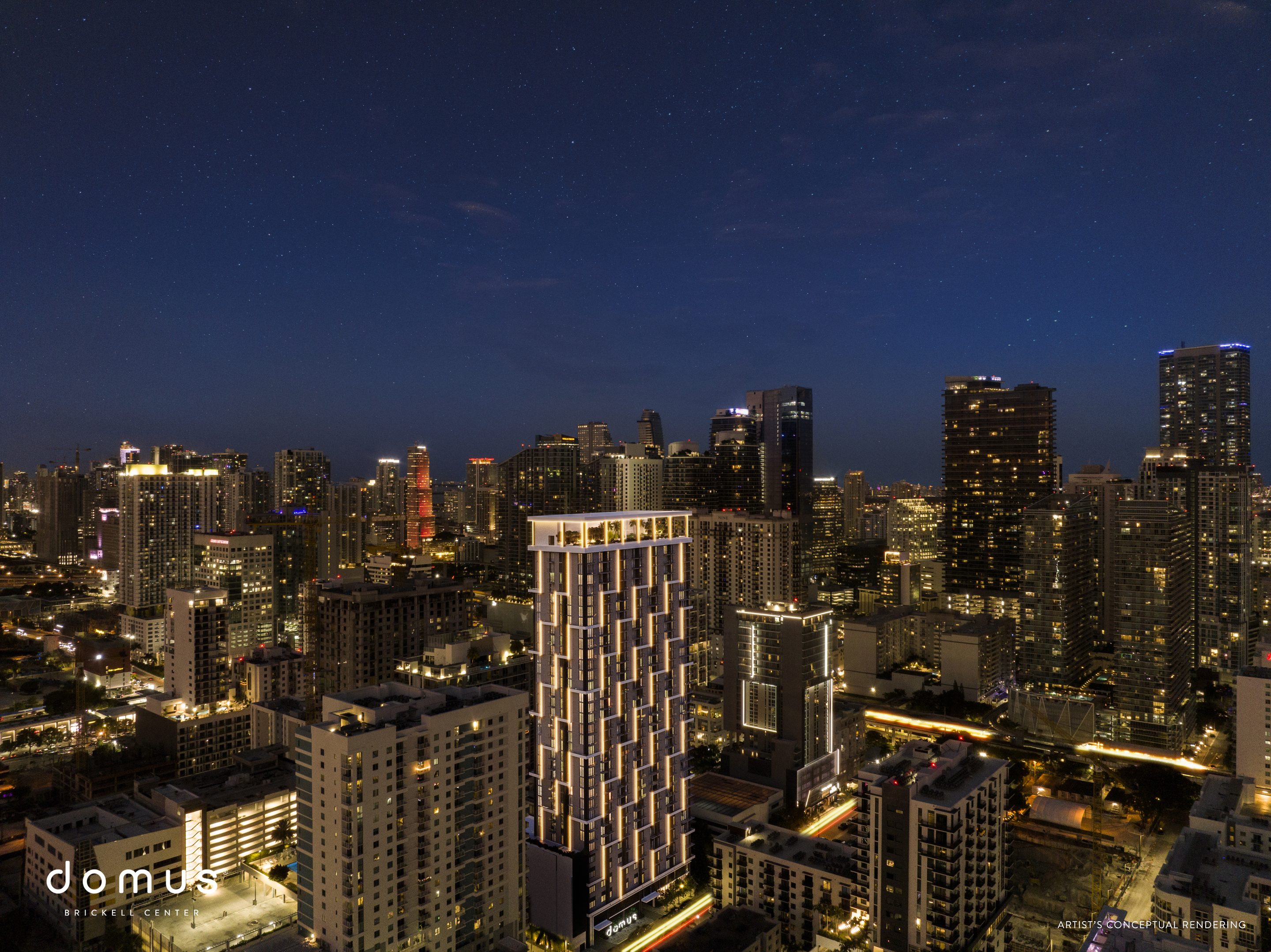 Domus Brickell Center at night above the Brickell skyline